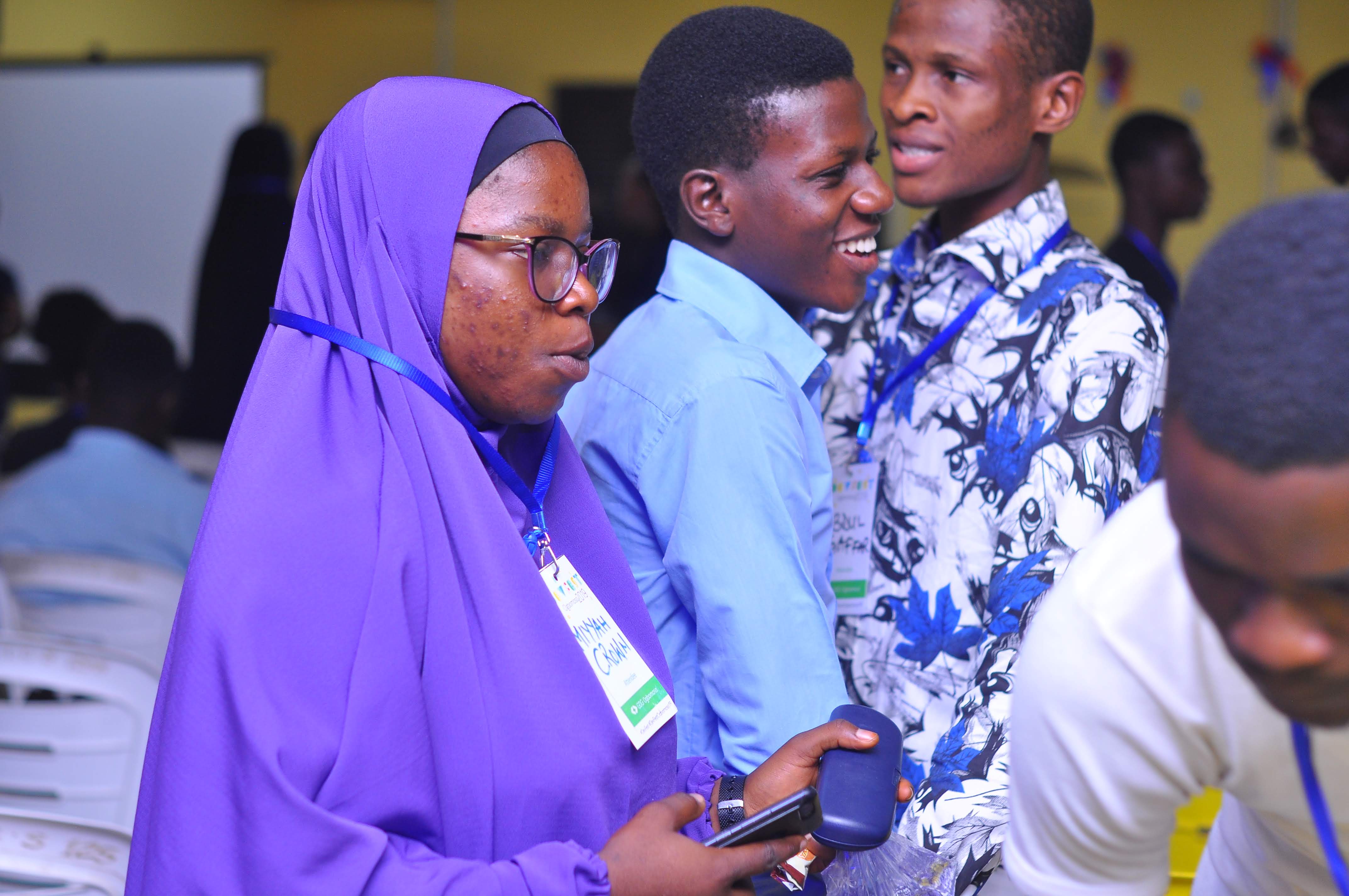 Attendees with name badges standing together at DevFest Ogbomoso 2019