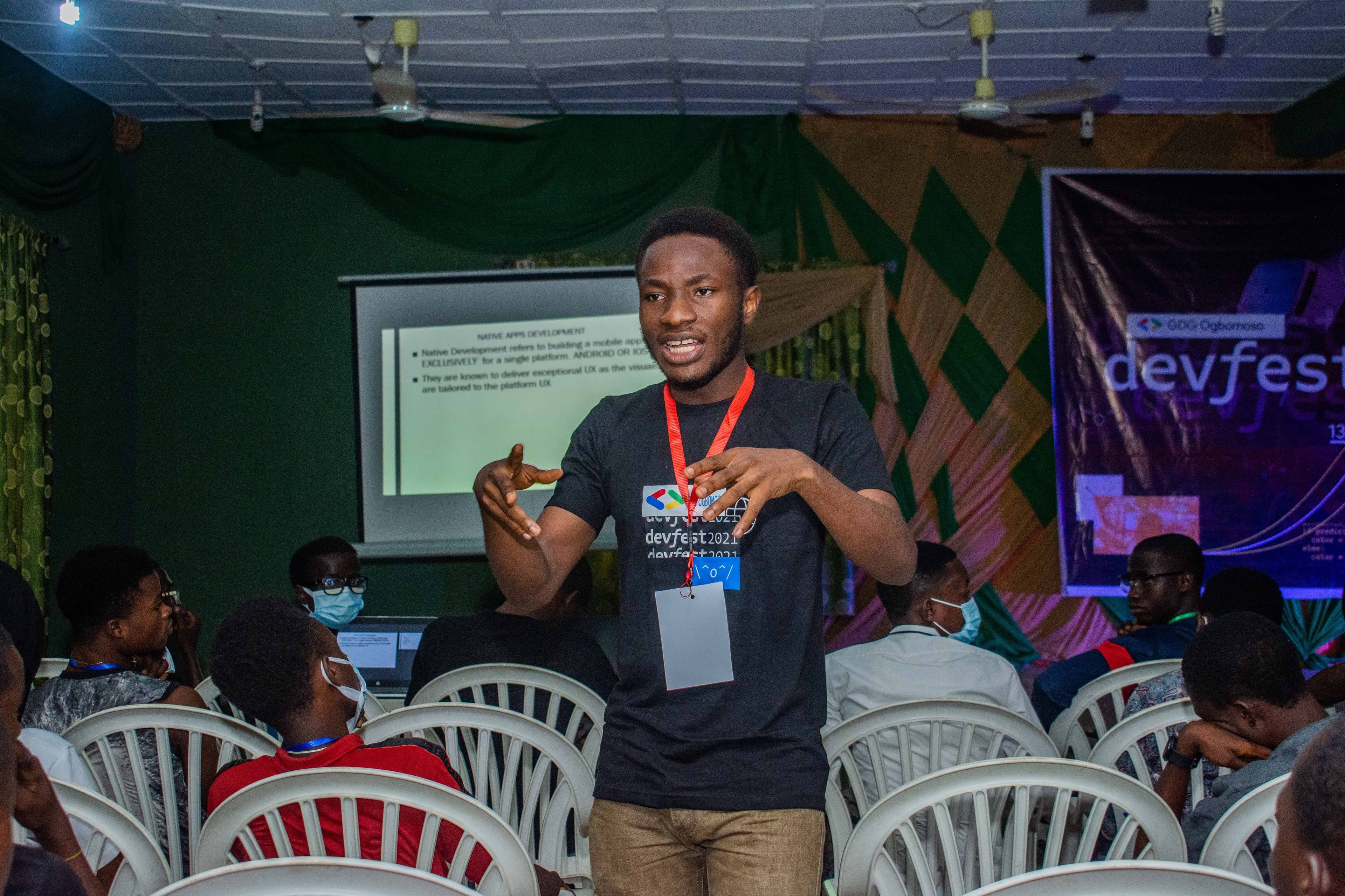A speaker addressing attendees from the floor at DevFest Ogbomoso 2021