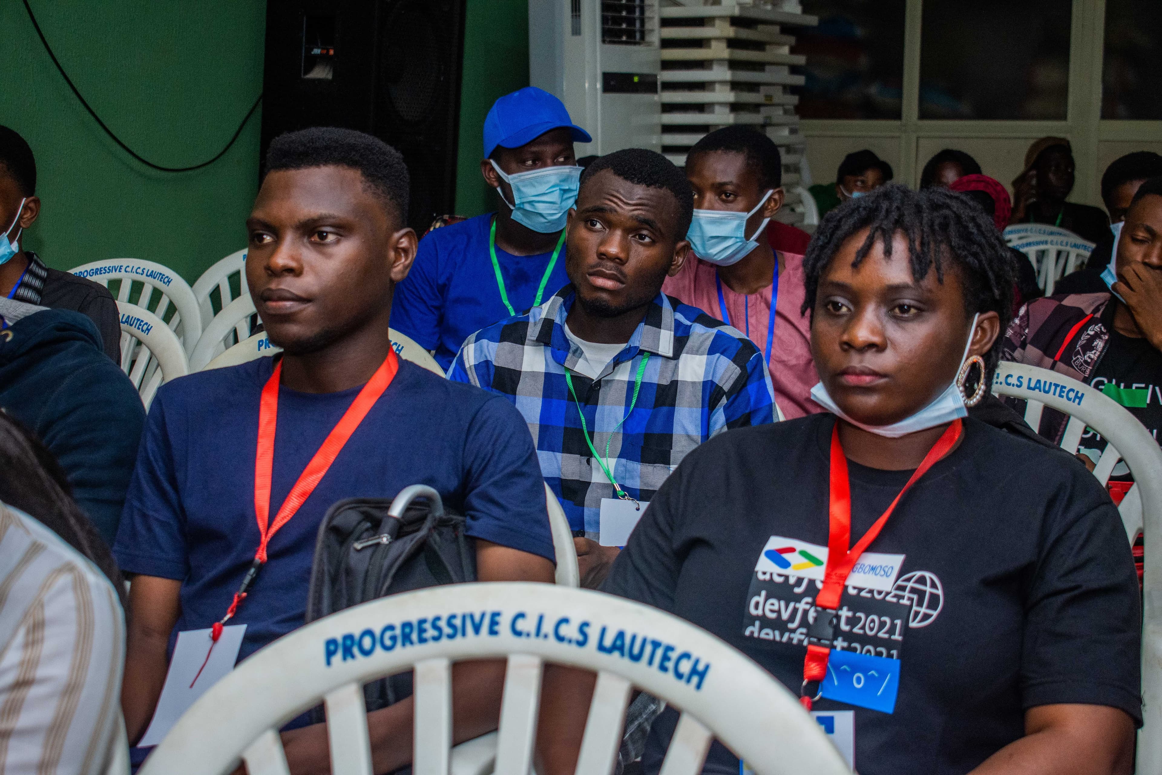 Attendees wearing their conference badges at DevFest Ogbomoso 2021