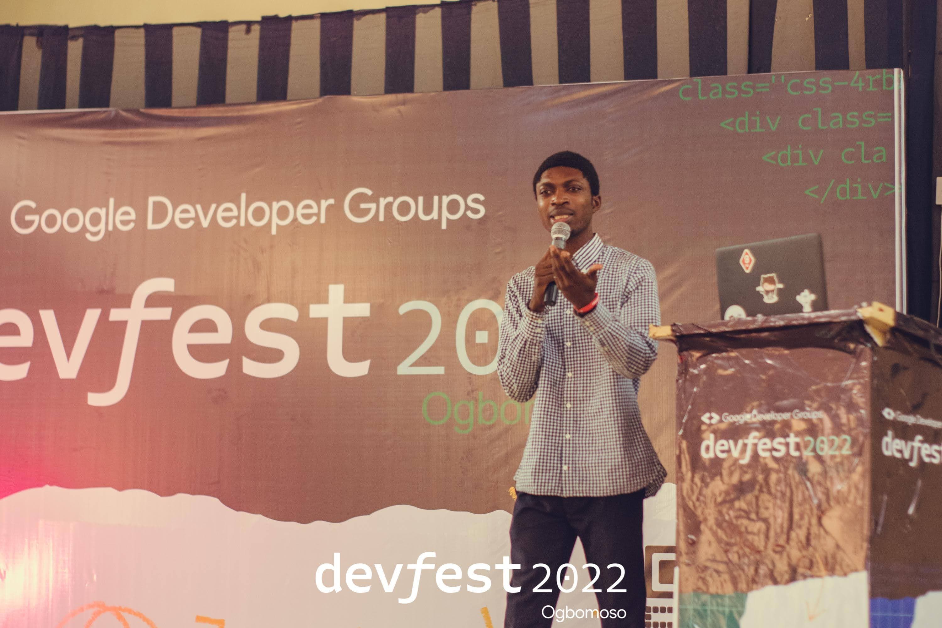 A speaker at the conference podium at DevFest Ogbomoso 2022