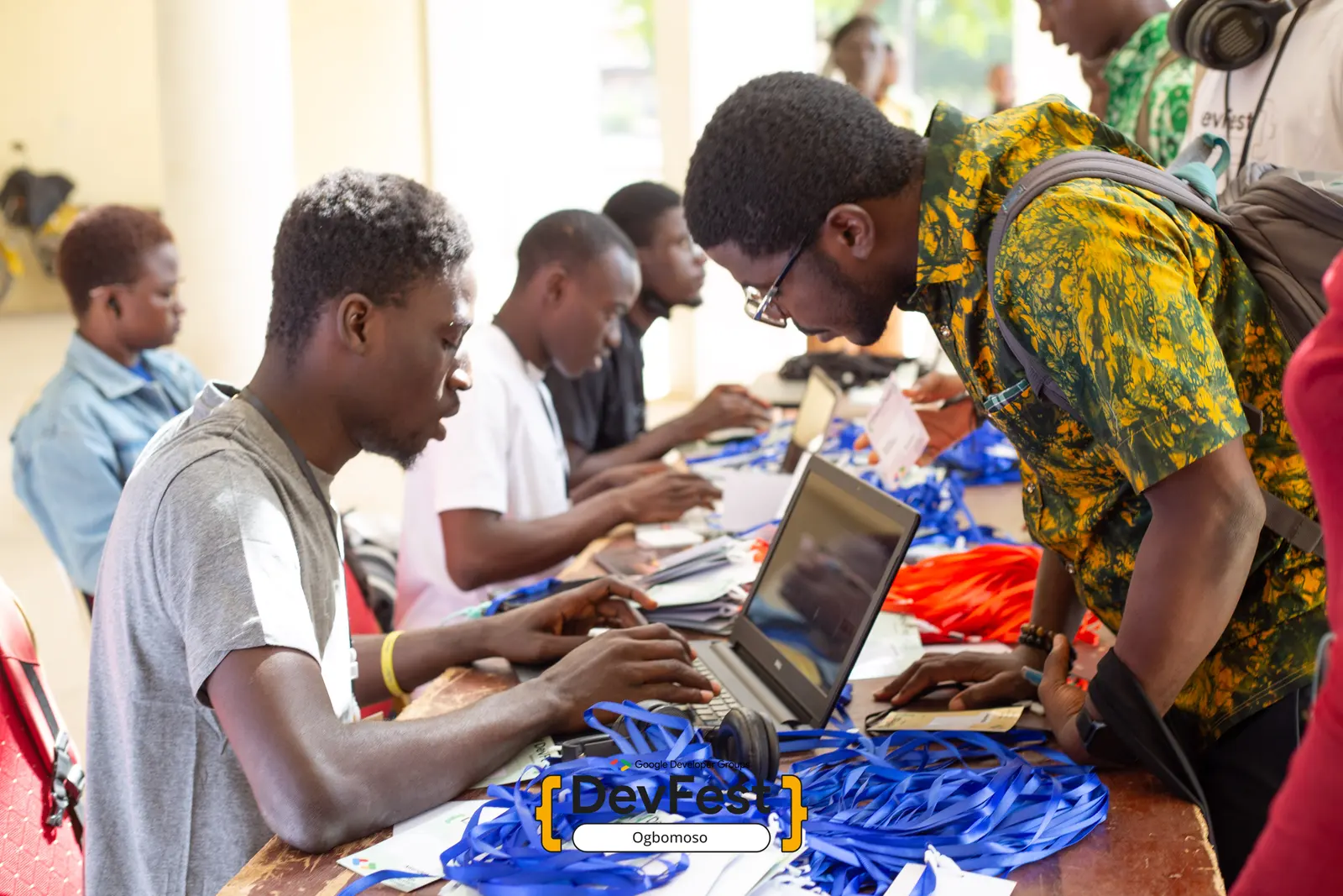 Volunteers checking attendees in at the registration desk